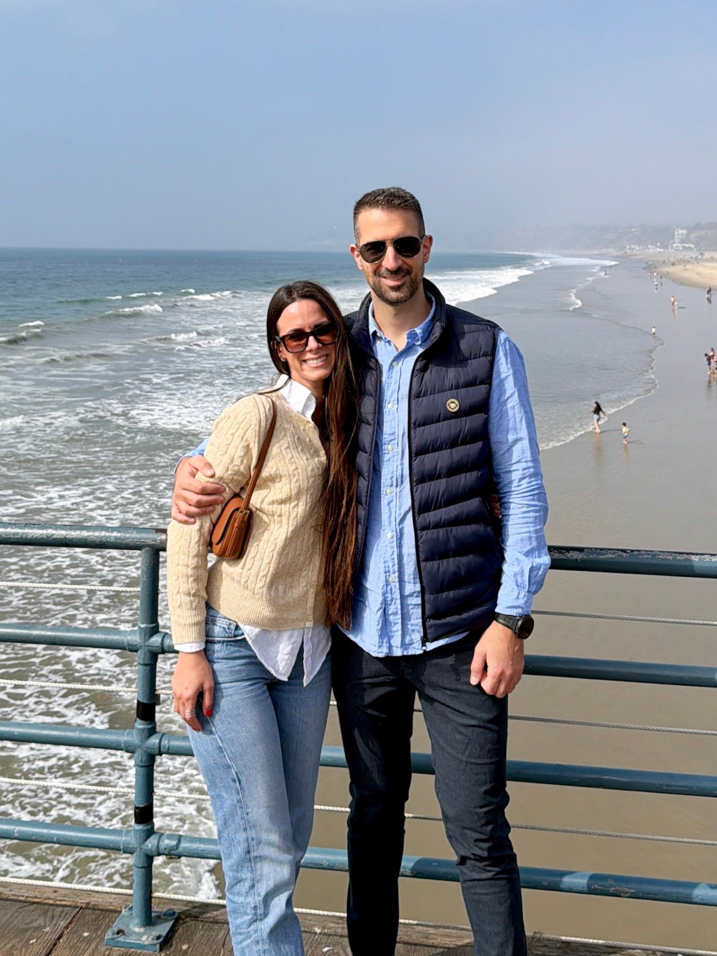 Konstantina and Alex standing together on Santa Monica Pier